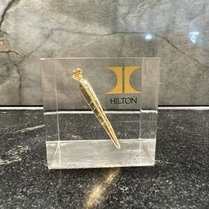 Hilton Hotel VTG Acrylic 2" Square Paperweight RARE Encased Gold Carrot